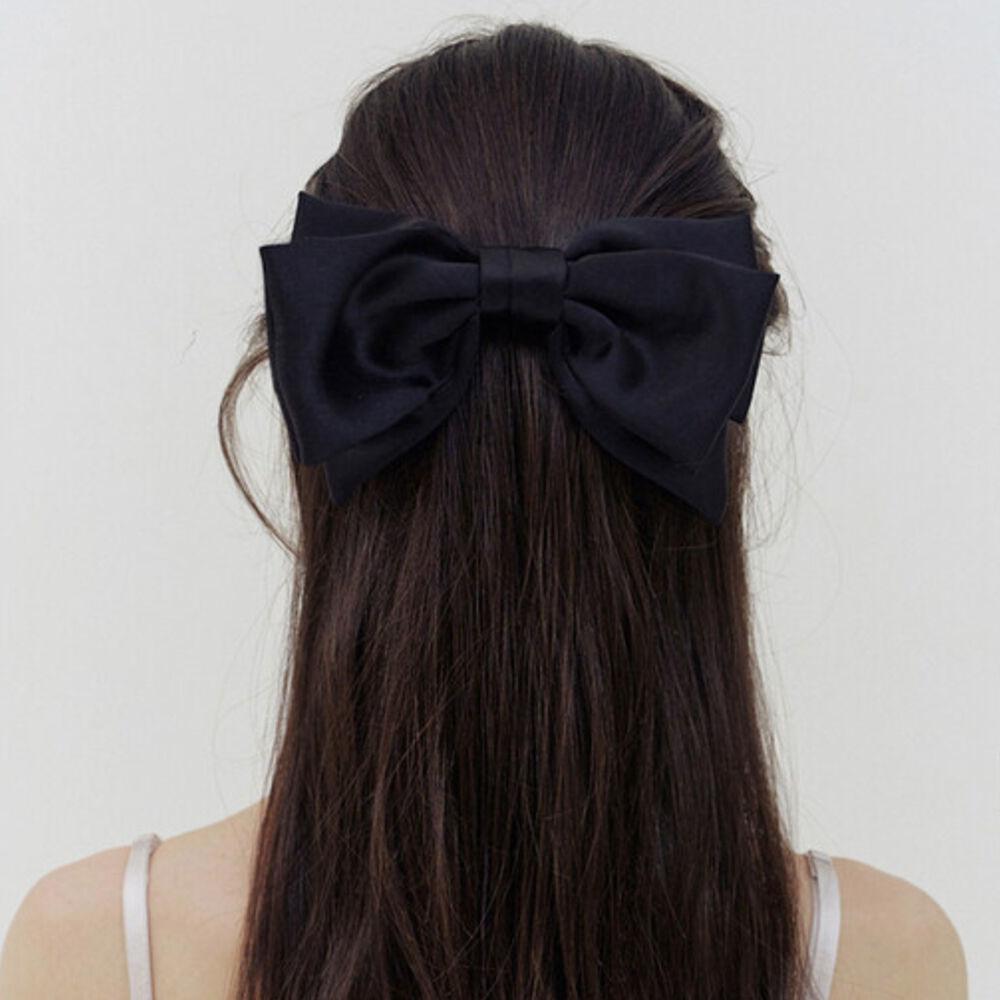 rosy silky black ribbon pin