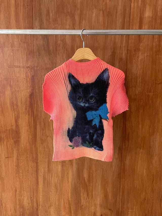 Orange neko pleats top
