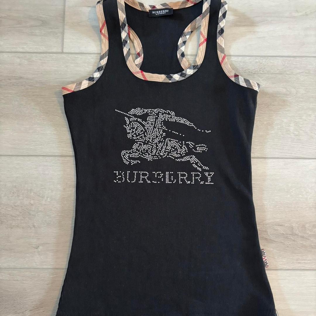 Burberry bedazzled tank topMissing some gems as...