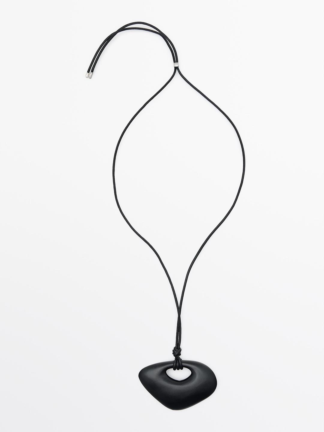 Necklace with wooden piece