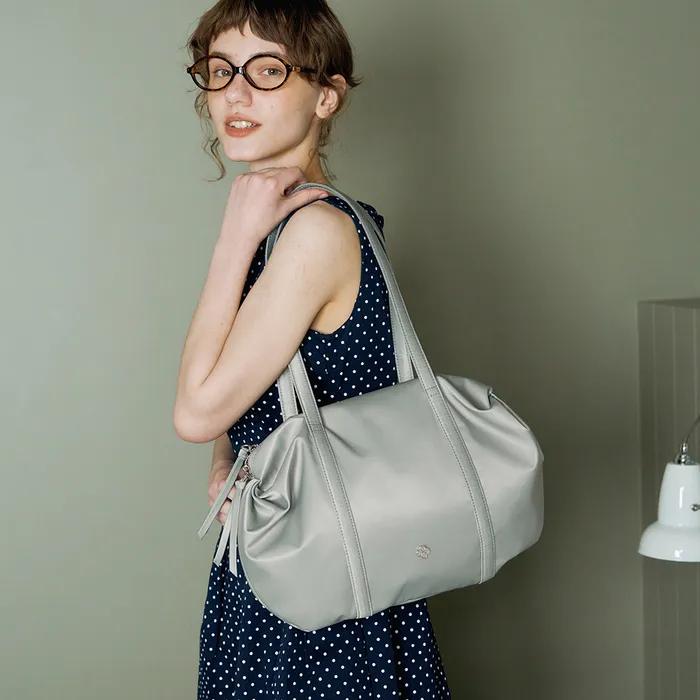 오로라 셔링 더플백_실버