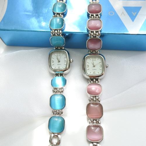 2006 AVON birthstone cat's eye link watch