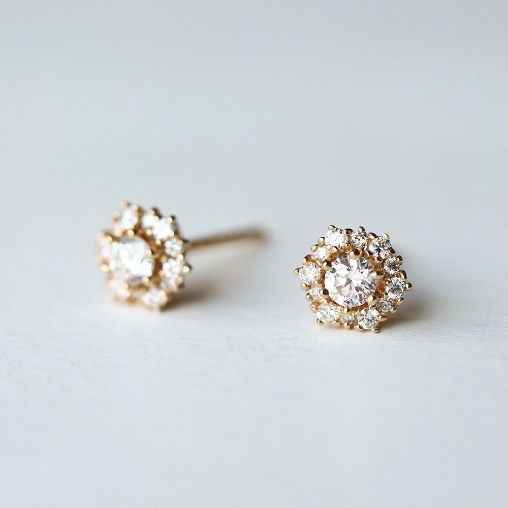 0.1ct snow flake diamond earrings
