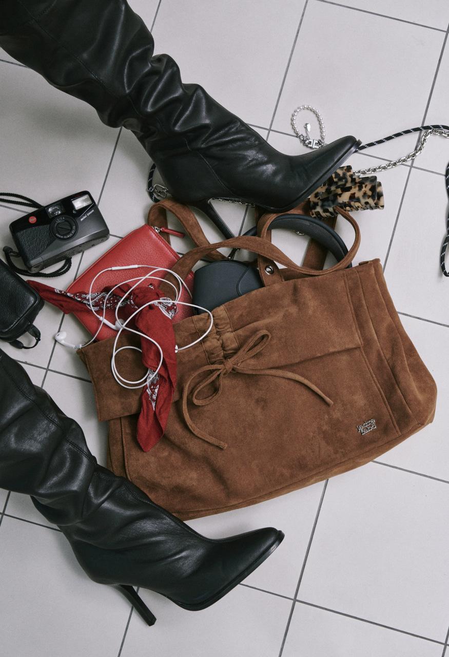 Suede butterfly flap bag brown