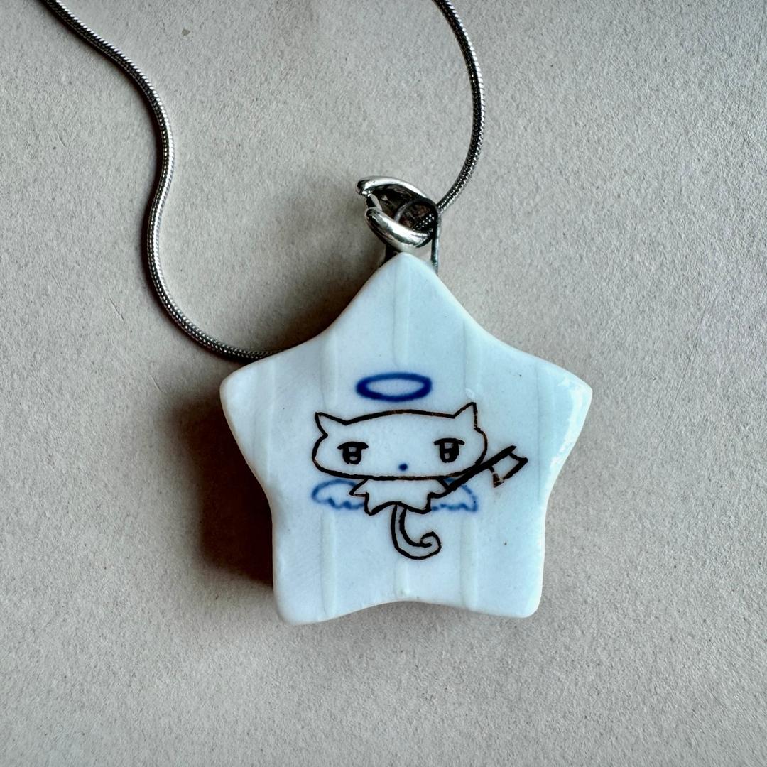 Angel kitten with ax necklace