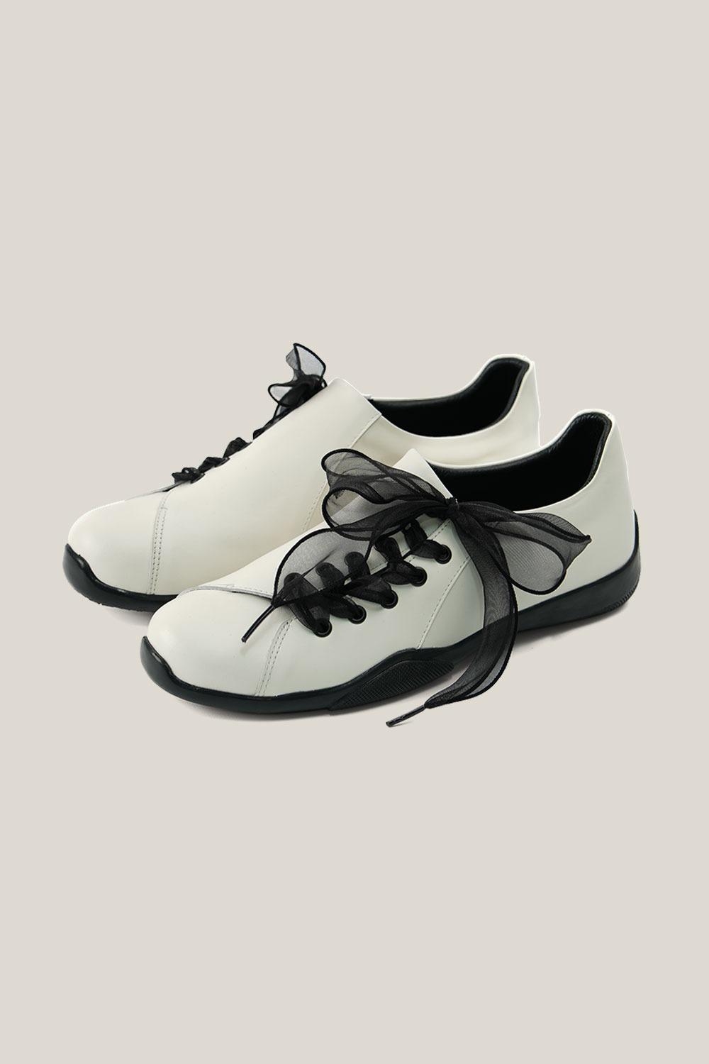 나타 커브드 스니커즈