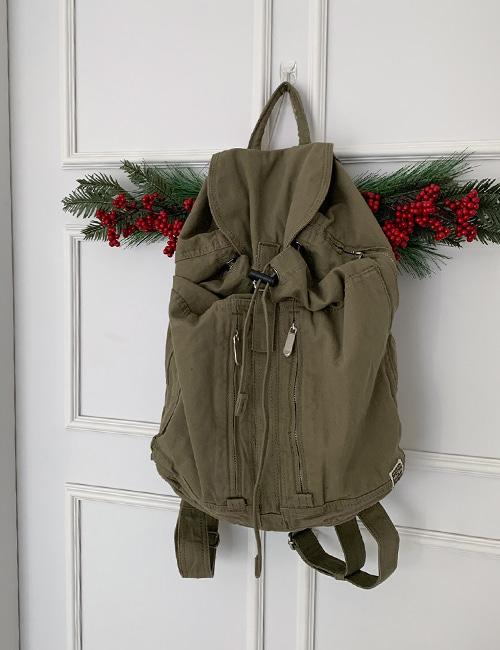 khaki pocket backpack