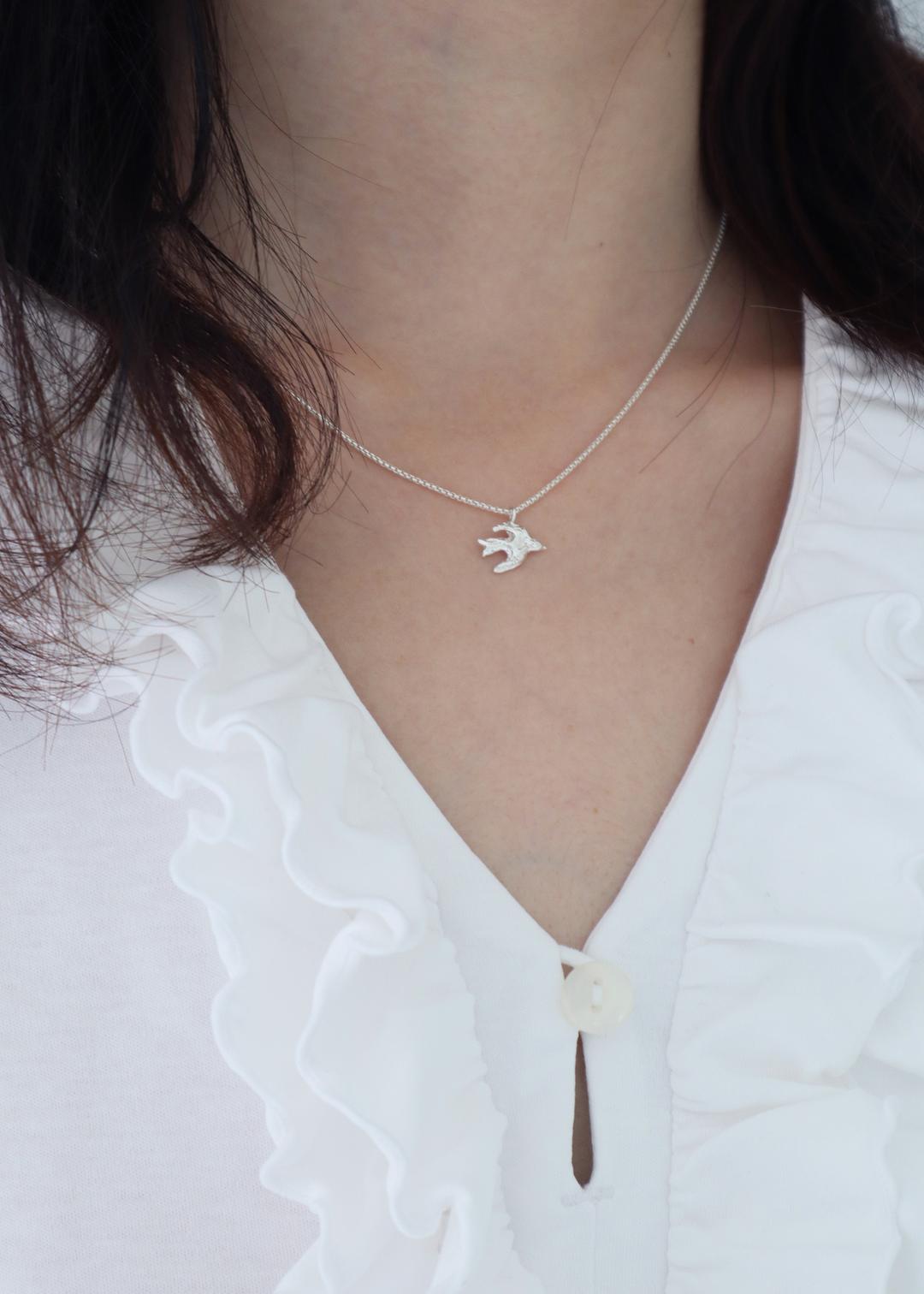 tiny Swallow, letter, clover