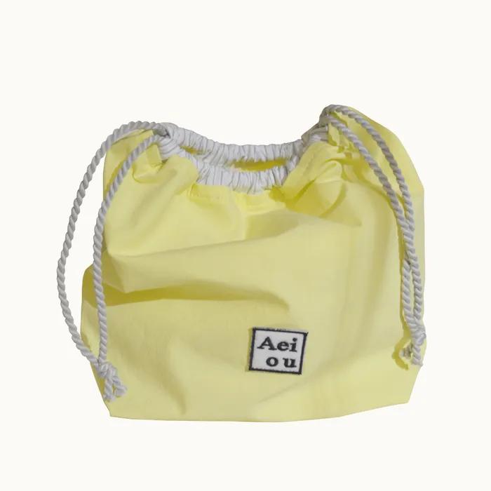 Aeiou String Pouch Lemon(Silver)