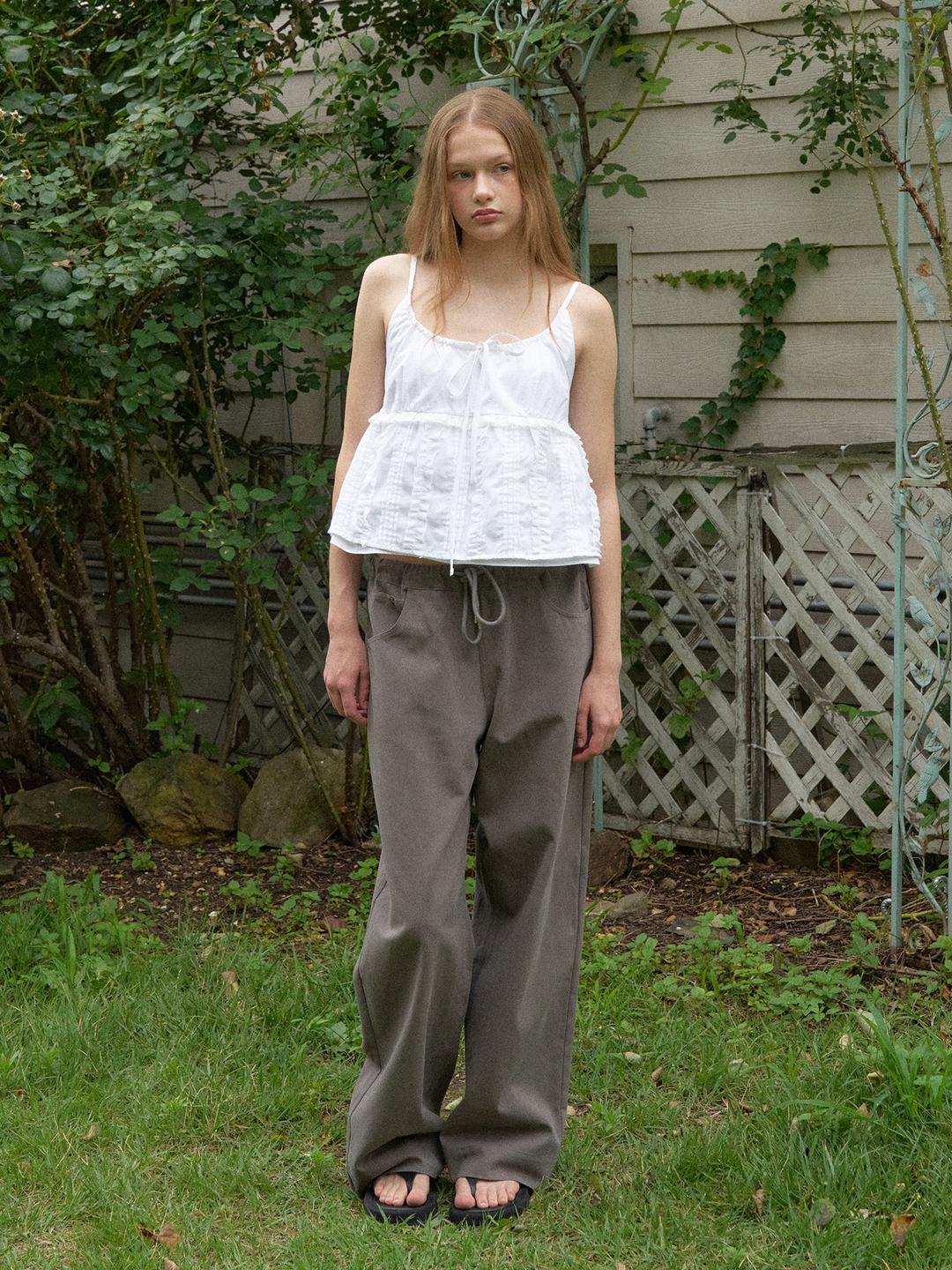 worn cotton pants (brown)
